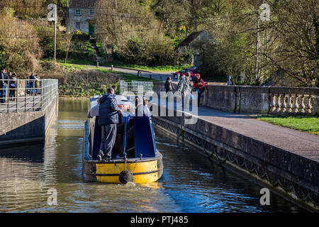 Canal boat crossing AvonCliff Aqueduct near Bradford on Avon, Wiltshire, UK on 23 March 2014