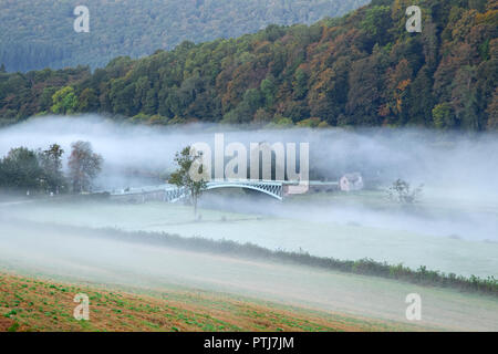 Bigsweir bridge in the lower Wye valley surrounded by morning mist. Stock Photo