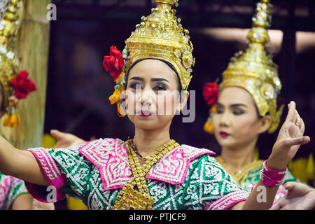 Bangkok, Thailand - August 26, 2018: Dancer performing a traditional Thai dancing for the worshippers at Erawan Shrine in Bangkok, Thailand. Stock Photo