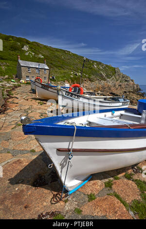 Fishing boats on the cobbled slipway at Penberth Cove. Stock Photo