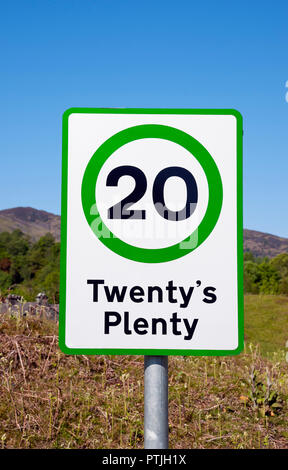 A Twenty's Plenty road sign with green border. Glasgow, Scotland, UK