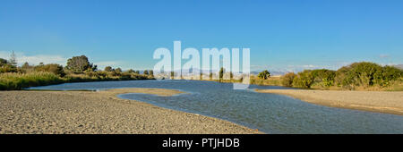 Guadalhorce river estuary seen from the beach of the mediterranean sea at Malaga, Spain. low angle panoramic view Stock Photo