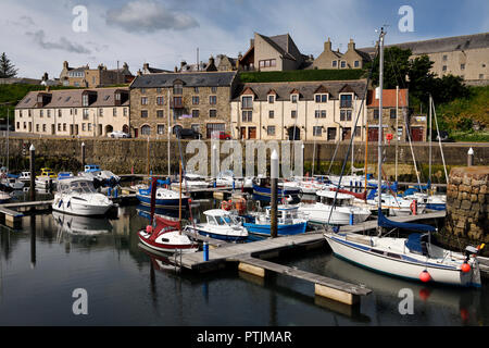 Boats and sailboats docked at Banff Harbour marina on Banff Bay Aberdeenshire Scotland UK Stock Photo