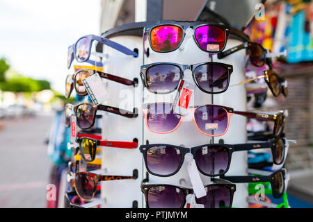 ALANYA / TURKEY - SEPTEMBER 30, 2018: Sunglasses from Ray-Ban hangs on a stand at a local market in Alanya. Stock Photo