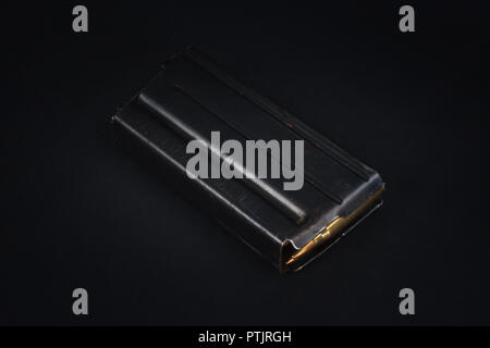 US ARMY M16 Rifle 20rd Magazine Vietnam war period with ammo on black background Stock Photo