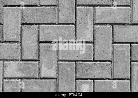 Stone paving texture. Abstract gray pavement background. Stock Photo