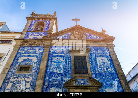 Traditional historic facade in Porto decorated with blue hand painted tin-glazed tiles, Oporto, Portugal Stock Photo