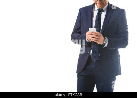 cropped image of smiling businessman in eyeglasses checking smartphone isolated on white background Stock Photo
