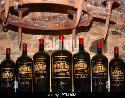 Bottles of wine in the tasting room at Castello di Amorosa winery, housed in a reproduction 13-century medieval Italian stone castle in Calistoga, Cal Stock Photo