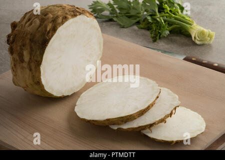 Fresh raw organic celery root and slices closeup Stock Photo