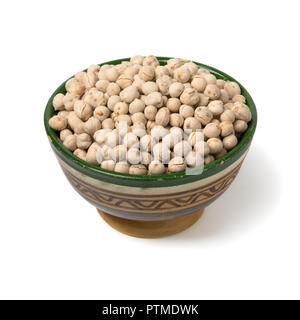 Bowl with traditional Moroccan roasted chickpeas isolated on white background Stock Photo