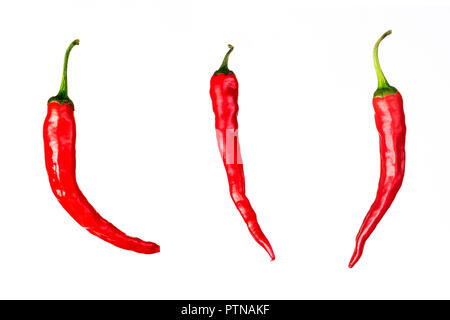 three pieces of red chili peppers isolated on white background Stock Photo
