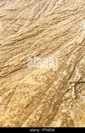 Natural brown rock texture eroded by the water Stock Photo