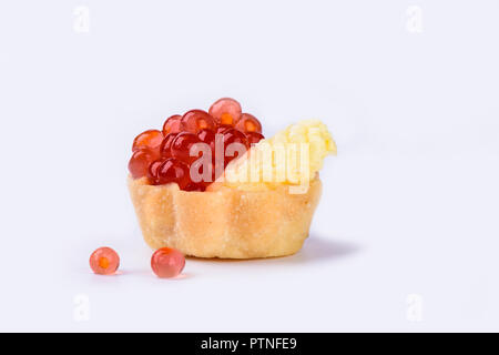 Tartlet with red caviar and butter isolated on white background Stock Photo