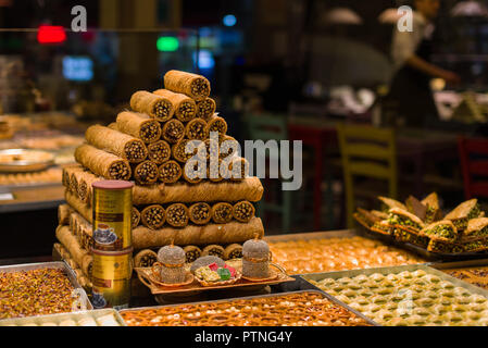 Various Turkish baklava on display in a restaurant window, Istanbul, Turkey Stock Photo