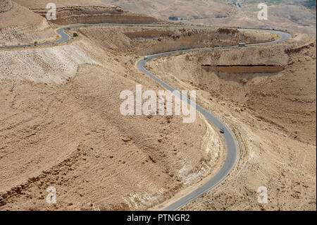 panoramic view from the King's Highway, which swoops over the high ridge of the Great Rift Valley. in Jordan Stock Photo