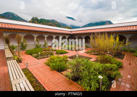 Aich, Austria - November 3, 2017: Monastic herbal garden with arcades that belongs to Benedictine European Monastery Aich. Stock Photo