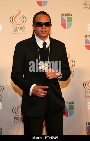 Daddy Yankee celebrates winning the urban genre album of the year award at  the 2007 Premios Lo Nuestro show at the American Airlines Arena in Miami,  on February 22, 2006 Stock Photo - Alamy