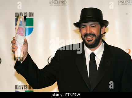 Daddy Yankee celebrates winning the urban genre album of the year award at  the 2007 Premios Lo Nuestro show at the American Airlines Arena in Miami,  on February 22, 2006 Stock Photo - Alamy
