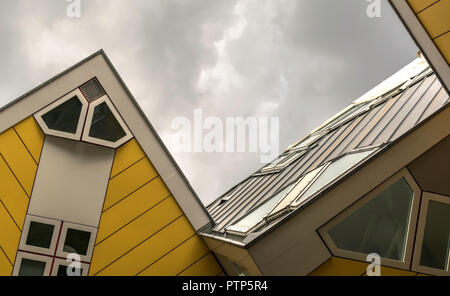 Cube Houses viewed from beneath in dull cloudy day.  It is a set of innovative houses Stock Photo