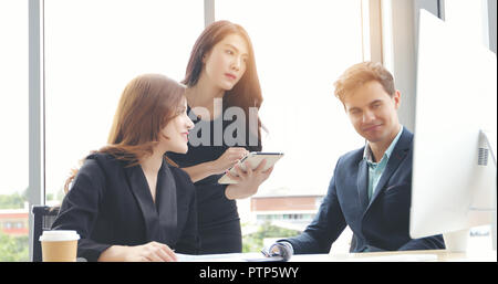 Businessmen and group using notebook for partners discussing documents and ideas in meeting  and business serious for working Stock Photo