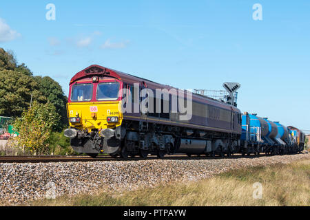 DAWLISH WARREN DEVON, UK - 03OCT2018: DB Cargo UK, Class 66 Diesel Electric Freight Locomotive no 66200 just south of Dawlish  Warren Station. Stock Photo