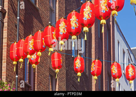 London, Westminster   Chinese lanterns hanging in Newport Place in Chinatown, celebrating the Chinese Mid-Autumn Moon Festival. Stock Photo
