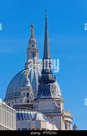 City of London   A contrast in architectural styles looking up Ludgate Hill towards St Paul's, with the 'needle' spire of St Martin within Ludgate . Stock Photo