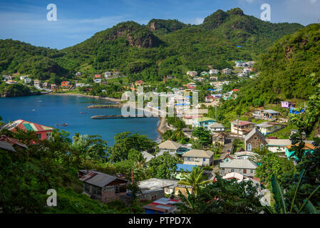 Sea and palm trees in Saint Vincent and the Grenadines, beautiful exotic paradise with mountains and beautiful perfect beaches and colorful turquoise Stock Photo