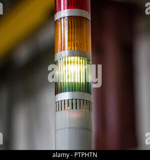 Production traffic light on which the green light is on, close-up, indicator Stock Photo