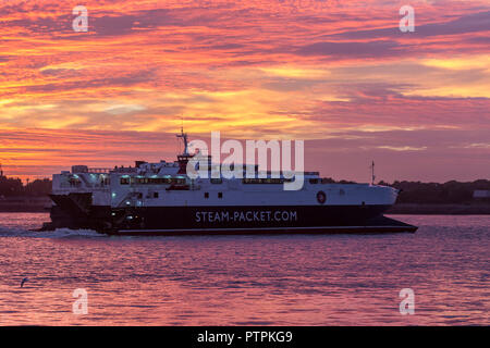 Steam-packet Isle of Man Ferry 'Manannan' as it Leaves Liverpool during a beautiful sunset with copy space top Stock Photo