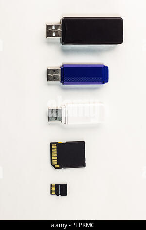 usb flash drives of different sizes on a white background Stock Photo