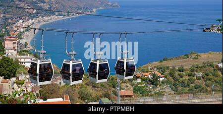 Cable car ride from the old town of Taormina to the beach of Mazzarò, Sicily, Italy Stock Photo