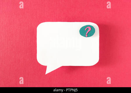 Symbol sign message from a white paper on a red background, social network, message, question Stock Photo