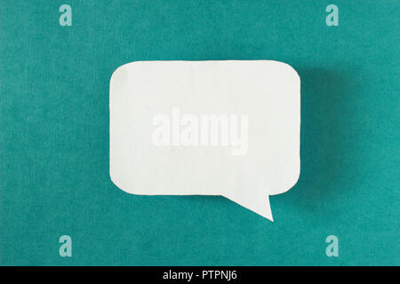 Symbol sign message from a white paper on a turquoise background, social network, message, symbol Stock Photo