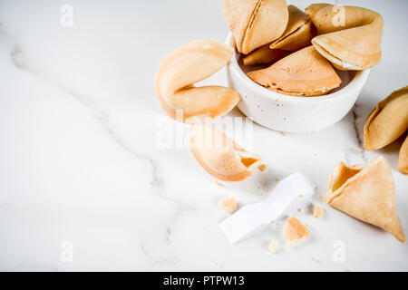 Chinese fortune cookie with prediction on white marble background  copy space Stock Photo