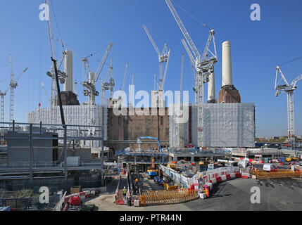 Tower cranes surround Battersea Power Station in London, during the multi-billion redevelopment of the 42 acre, riverside site. Stock Photo