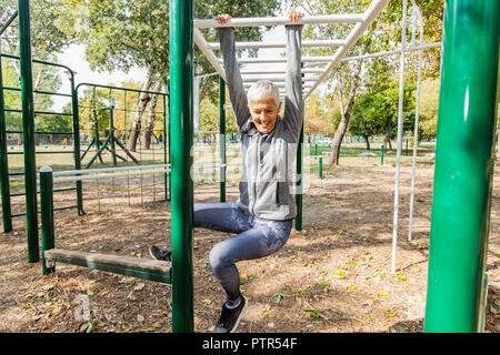 Fit Senior Woman Stretching At Outdoor Gym, Healthy Lifestyle Old People. Stock Photo