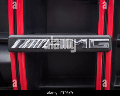 VILNIUS, LITHUANIA-AUGUST 26, 2018: Real AMG logo on a red radiator grill Stock Photo