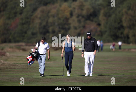 Jenni Falconer (centre) and Shane Lowry (right) during the British Masters Pro-Am at Walton Heath Golf Club, Surrey. Stock Photo
