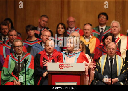 Hillary Clinton makes an address during a ceremony at Queen's University Belfast where she is being awarded an honorary degree. Stock Photo