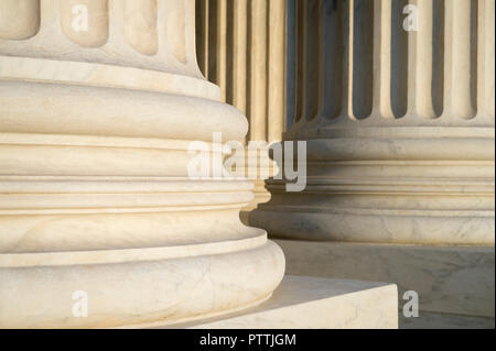 White marble neoclassical columns of the portico of the Supreme Court of the United States building in Washington DC, USA Stock Photo