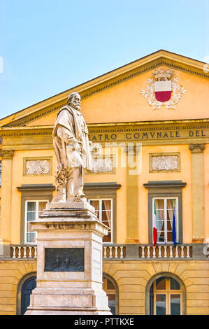The marble statue to Giuseppe Garibaldi in Piazza del Giglio with frontage of Opera Theater on the background, Lucca, Italy Stock Photo