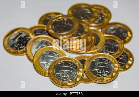 Bunch of real brazilian coins golden. Stock Photo