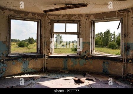 The relics of the soviet air base of Rangsdorf in former East Germany. Inside the control tower. Stock Photo