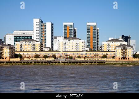 Modern riverside apartments at Virginia Quay, Canning Town London England UK Stock Photo