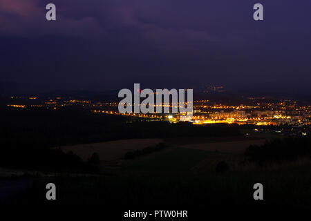 Abstract urban night light bokeh defocused background Stock Photo