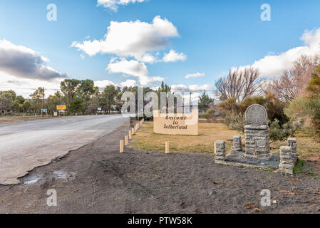 SUTHERLAND, SOUTH AFRICA, AUGUST 7, 2018: A street scene, with a welcome sign and Big Trek monument, at the entrance to Sutherland in the Northern Cap Stock Photo