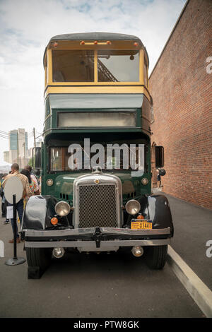 Double-decker bus at the 25th Annual New York City Transit Museum Bus Festival in Brooklyn Bridge Park in Brooklyn in New York on Sunday, October 7, 2018. Once a year the museum rolls out its fleet of vintage buses dating from the early 20th century to the most current vehicles allowing people to reminisce and wallow in nostalgia for the vehicles, which become a sort of time machine taking visitors back to another era. (Â© Richard B. Levine) Stock Photo