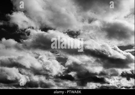 Altocumulus undulatus clouds making for a dramatic sky. Stock Photo